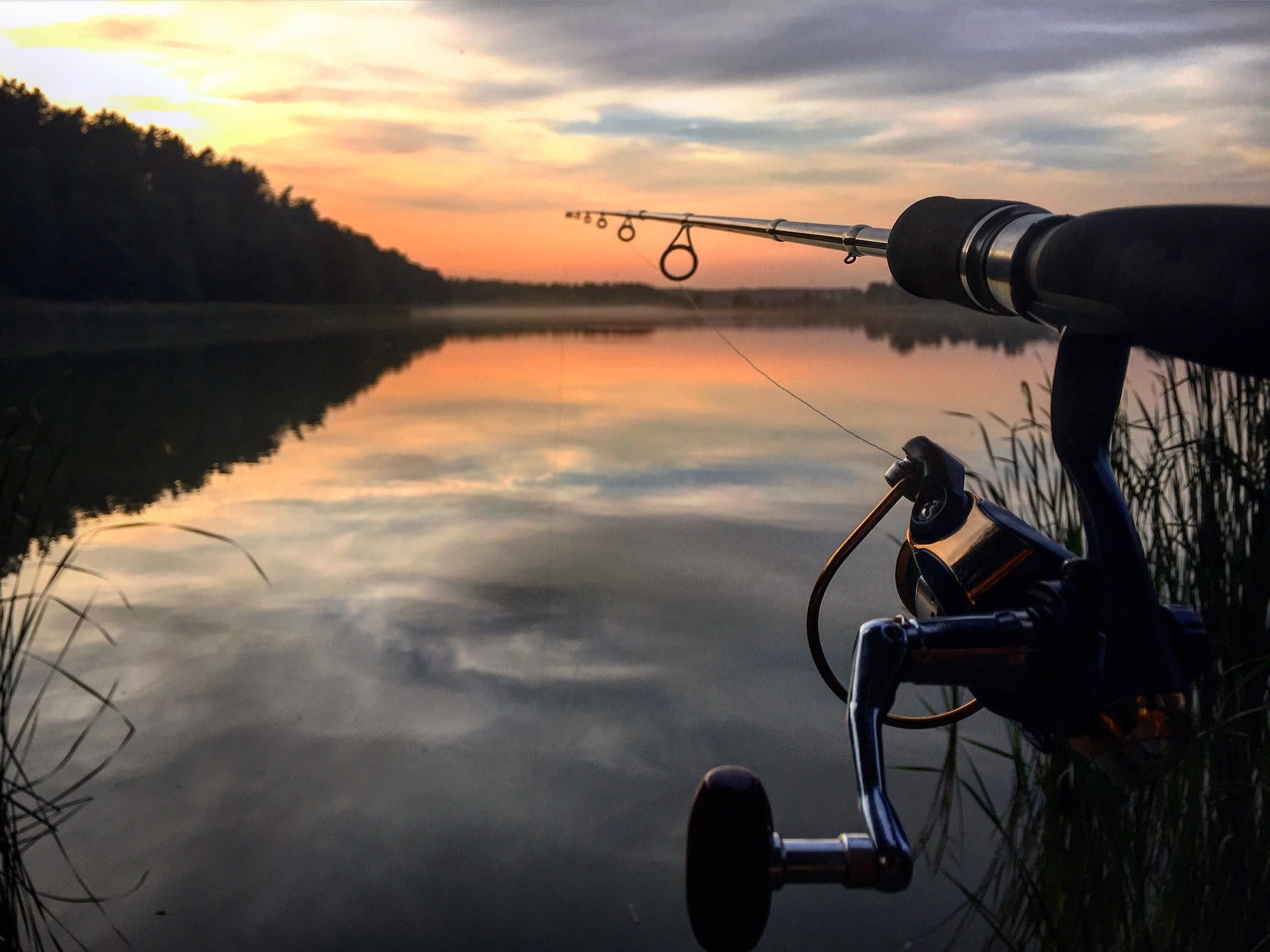 fishing at sunset